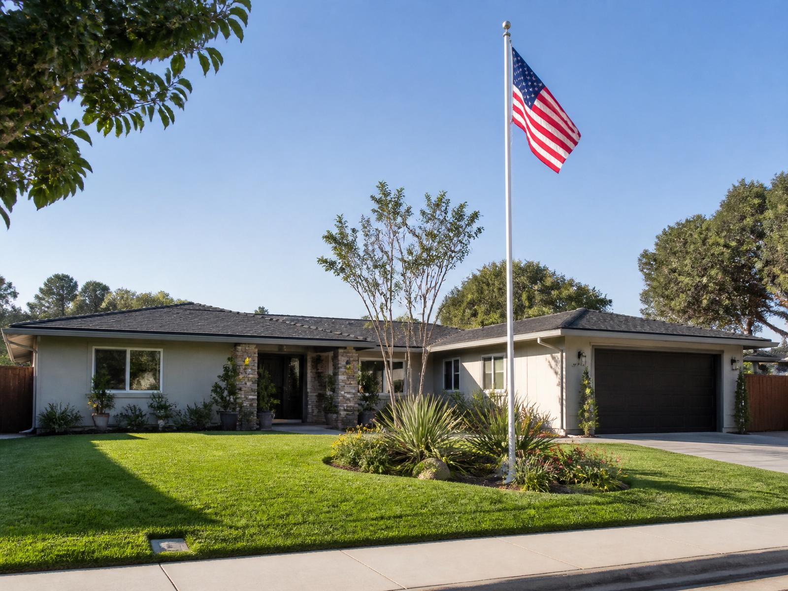 Residential flagpole installed in front of a California home